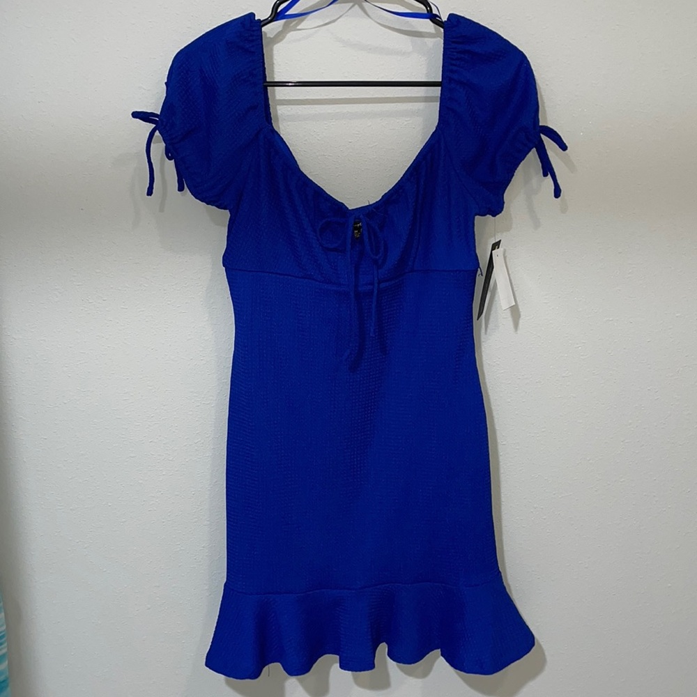 Brand New with Tags! Royal Blue body con dress with puff sleeves